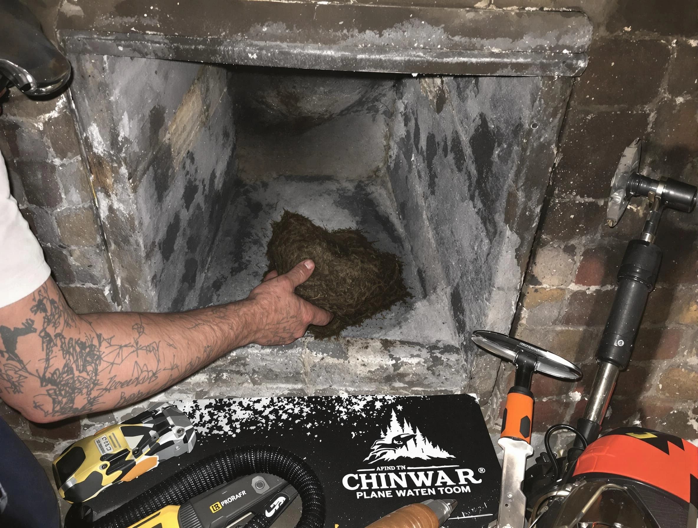 Magna Chimney Sweep safely removing debris and screening chimney in Magna, UT